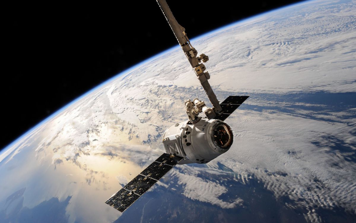A satellite orbiting above the Earth